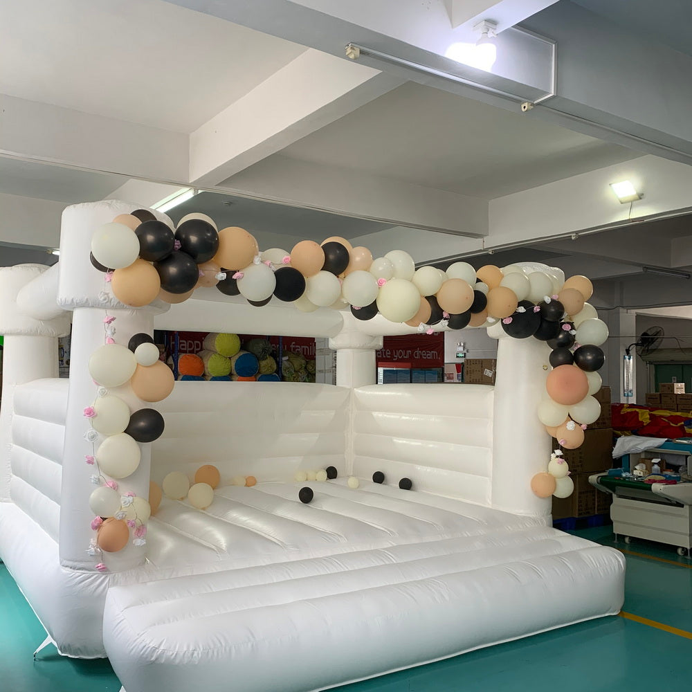 white wedding bounce house