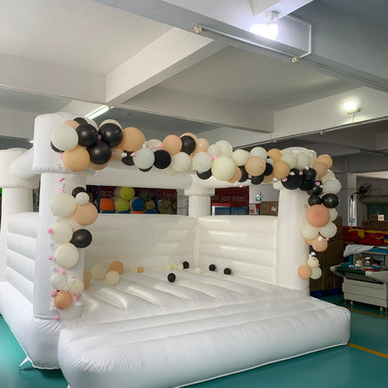 white wedding bounce house